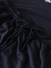 Manfinity Sport Corelite 2 Stücke Herren Einfarbig Blockfarbe Buchstaben Muster Kurzarm Top und Shorts Sport Freizeitanzug