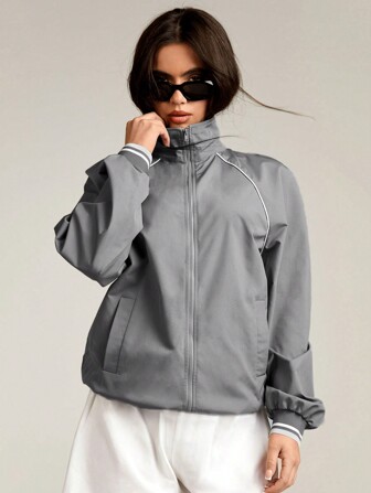 Athîral 女士纯色拼布前拉链口袋休闲长袖上衣