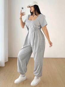 Flirla Plus Size damski sportowy kombinezon z krótkim rękawem i ściągaczem w pasie, z kieszeniami, minimalistyczny design