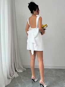 Elenzga Woman's Elegant Sleeveless Mini Dress With Oversized Bow Back Design, Scoop NeckParty