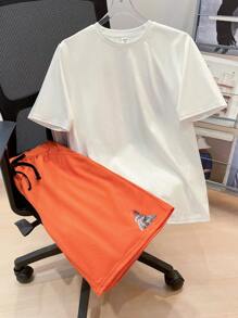 SHEIN Teen Boys Casual College Style Soft & Comfortable Versatile Practical Adorable Graphic Short Sleeve T-Shirt And Shorts Set, Suitable For Daily Wear, School, Travel, Sports, Cartoon Letter & Portrait Prints