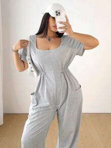 Flirla Plus Size damski sportowy kombinezon z krótkim rękawem i ściągaczem w pasie, z kieszeniami, minimalistyczny design