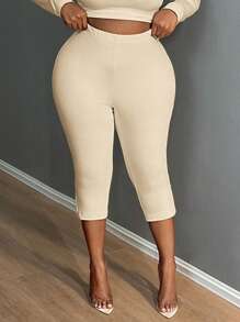 SHEIN SXY Leggings recortados divididos de color liso, leggings elásticos de cintura casual para uso diario, ropa de mujer talla grande