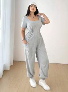 Flirla Plus Size damski sportowy kombinezon z krótkim rękawem i ściągaczem w pasie, z kieszeniami, minimalistyczny design