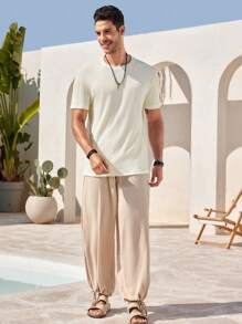 Manfinity RelaxMax T-shirt simple à col rond et manches courtes de couleur unie pour hommes, décontracté pour un usage quotidien