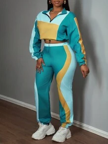 Slaydiva Conjunto informal de 2 piezas para mujer con chaqueta corta de cuello alto con cremallera y pantalón ancho de chándal con efecto color block