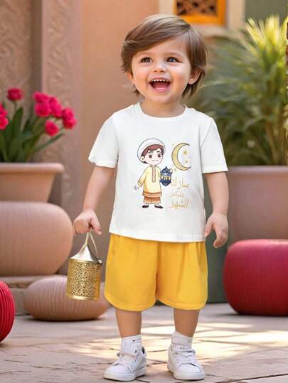 SHEIN Conjunto de 2 piezas de camiseta de manga corta con diseño de luna y shorts de cintura elástica, apto para niño/niña, para uso en primavera/verano, interior y exterior