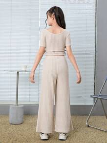 Tween GirlKnitted Pit Strip Slim Fit U-Shaped Collar Side Seam Gathered Short-Sleeved T-Shirt With Processed Word Pleats Loose Wide-Leg Trousers Two-Piece Set, Suitable For Spring And Summer,Back To School,Comfortable And Casual Outing