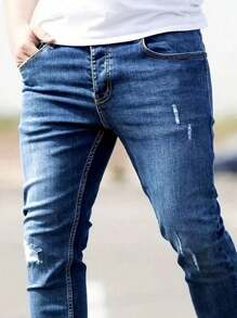 Manfinity Homme Jeans de mezclilla casuales con bolsillo y rotos simples talla grande para hombres