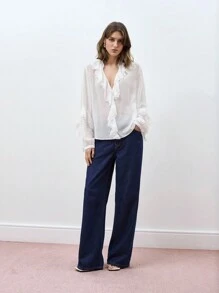 Maija Blusa de manga abullonada con cuello en V y ribete de volantes, camisa holgada y versátil de manga larga con botones delanteros y detalles de volantes en estilo bohemio para principios de primavera, en un look urbano y elegante