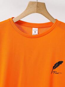 SHEIN Tween Boy Casual Comfortable Round Neck Feather Print Short Sleeve T-Shirt Paired With Solid Color Pants 2 Pieces Set