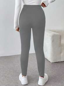 Chiquease Pantalones casuales sencillos y ajustados de unicolor con bolsillo y botones frontales para mujer