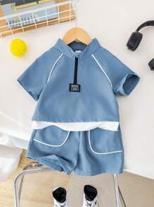 Set de 2 piezas para niño pequeño: Chaqueta casual azul de manga corta y cuello alto, y pantalones cortos. Apto para vestuario de niños, ropa de niño, de vuelta al colegio, conjuntos para niños, adecuado para fiestas de cumpleaños, fiestas de noche, actuaciones, bodas, ceremonias de apertura, uso diario, colegio, viajes, deportes