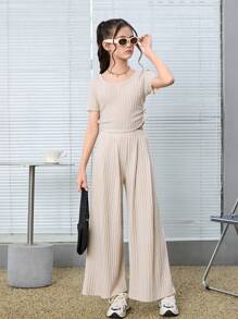 Tween GirlKnitted Pit Strip Slim Fit U-Shaped Collar Side Seam Gathered Short-Sleeved T-Shirt With Processed Word Pleats Loose Wide-Leg Trousers Two-Piece Set, Suitable For Spring And Summer,Back To School,Comfortable And Casual Outing