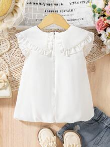 The New Style Of Short-Sleeved Chiffon Top With A Bowknot For Young Girls. It Features A Bubble Hem, Is Comfortable, And Represents The Fashion , Being Elegant, Sweet, And Cute, A Must-Have For Daily Wear