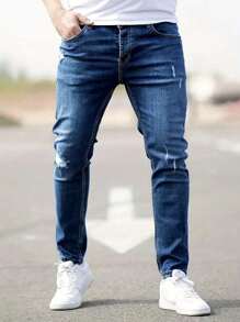 Manfinity Homme Jeans de mezclilla casuales con bolsillo y rotos simples talla grande para hombres