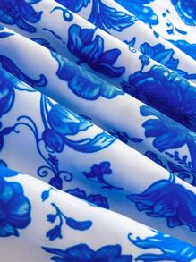 SHEIN Young Girl Eid Mubarak Blue Floral Print, Golden Belt Patchwork V-Neck Cinched Waist Long Sleeve Dress, Suitable For Party, Banquet, Vacation In Summer