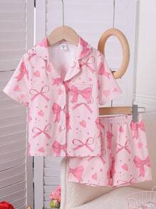 Bộ đồ ngủ tay ngắn cổ ve in nơ cho bé gái, quần short và áo ngủ chống cháy - Bụi hồng - Xem 1
