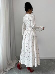 Modelyn 女士编织花卉印花荷叶边下摆长袖纽扣腰 A 字连衣裙 - 杏色 - 查看 2