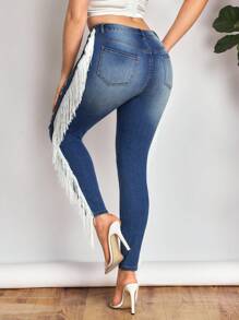 SHEIN SXY Jeans de talle bajo rasgados para mujer, nueva moda de verano con flecos laterales, pantalones vaqueros elásticos sexy y ajustados. - Azul - Ver 2