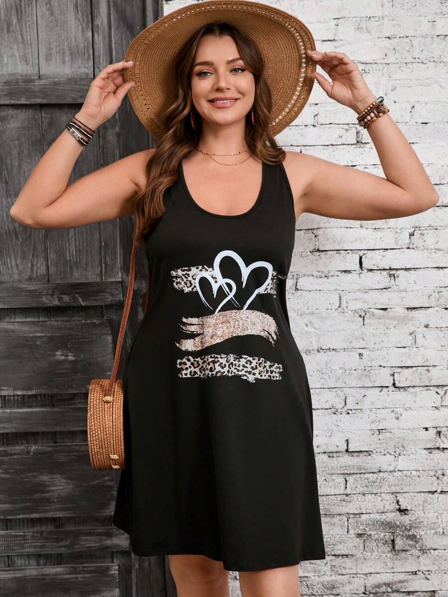 SHEIN VCAY Vestido de punto holgado de cuello redondo negro con estampado de corazón de leopardo en el pecho delantero, para uso diario casual en la playa, talla grande, apto para uso en San Valentín, ropa occidental para mujeres, festival, bohemio, hippie, atuendo de vaquera, playa en Ibiza, atuendos de verano para mujeres, ropa de verano, atuendo del Día de San Patricio, atuendos de primavera para mujeres, estampado de leopardo