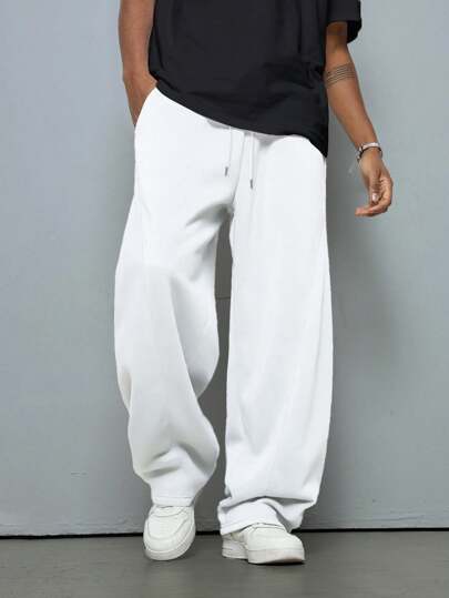 Manfinity Hypemode Pantalón de chándal de unicolor con cordón y bolsillo para hombres, uso casual diario simple