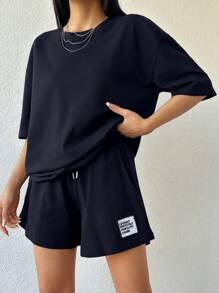 RueChic Maglietta di cotone al 100% da donna tinta unita e pantaloncini di cotone con dettagli ricamati