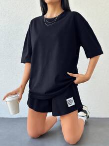 RueChic Maglietta di cotone al 100% da donna tinta unita e pantaloncini di cotone con dettagli ricamati