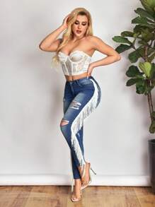 SHEIN SXY Jeans de talle bajo rasgados para mujer, nueva moda de verano con flecos laterales, pantalones vaqueros elásticos sexy y ajustados. - Azul - Ver 4