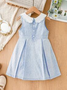 SHEIN Abito elegante e leggero senza maniche in tessuto jacquard intrecciato blu per bambina, con una silhouette confortevole, ideale per la stagione calda. Nel suo design, è completato da un colletto ondulato bianco ricamato in modo unico, aggiungendo un tocco raffinato ed elegante. Che sia per uscite, shopping o feste, assicura che il bambino si distingua tra la folla.