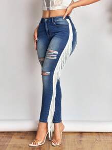 SHEIN SXY Jeans de talle bajo rasgados para mujer, nueva moda de verano con flecos laterales, pantalones vaqueros elásticos sexy y ajustados. - Azul - Ver 6