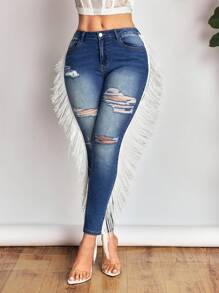 SHEIN SXY Jeans de talle bajo rasgados para mujer, nueva moda de verano con flecos laterales, pantalones vaqueros elásticos sexy y ajustados. - Azul - Ver 5