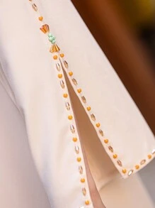 Layrah Handgemachte perlenbestickte aprikotfarbene Alltagsmode