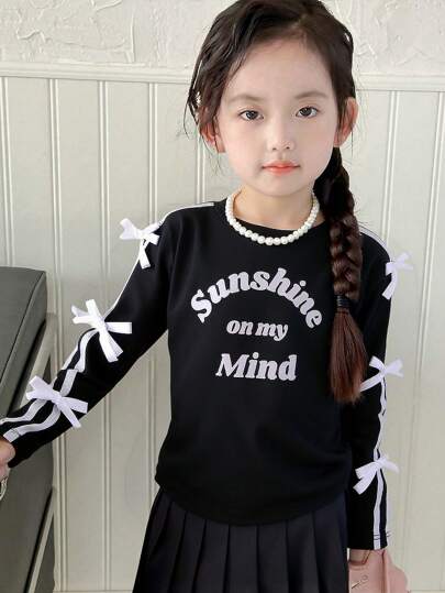 年轻女孩黑色短袖时尚字母印花白色可爱 3D 蝴蝶结装饰圆领舒适潮流 T 恤