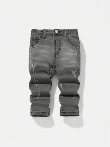 SHEIN Jeans negros de mezclilla elástica suave y cómoda con rotos y mostachos de gato para bebés niños, casuales y versátiles para ropa de otoño/invierno para interiores/exteriores