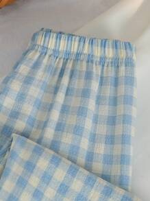 SHEIN Genkimix Kids 2 件套女孩卡通小狗与蝴蝶结印花针织长袖上衣和长裤睡衣套装