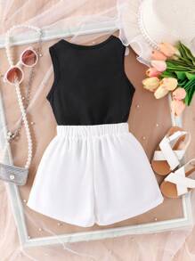 2 件套年轻女孩针织无袖 V 领白色五瓣花上衣和荷叶边短裤套装，时尚优雅的夏季服装 - 黑色 - 查看 2