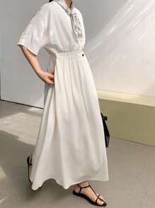 Dazy-Less Lässiges, geschäftsmäßiges, locker designtes asymmetrisches Knopf-Taille Midi-Kleid für Frauen, Outfit für Lehrerinnen