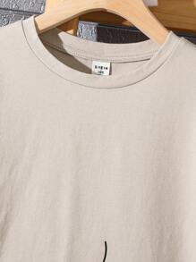 SHEIN Conjunto de 2 peças de camiseta e shorts casuais para meninos adolescentes com gola redonda e videogame gráfico