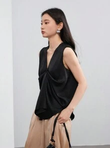 Dazy-Less Débardeur casual à torsion ample de couleur unie et style artistique pour femmes