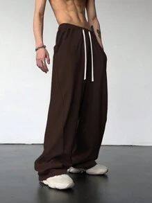 Manfinity Hypemode Pantalon de survêtement ample pour hommes avec cordon de serrage à la taille et poches en biais