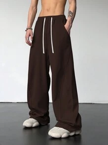 Manfinity Hypemode Pantalon de survêtement ample pour hommes avec cordon de serrage à la taille et poches en biais