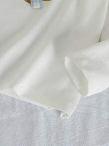 SHEIN Genkimix Kids 2 件套女孩卡通小狗与蝴蝶结印花针织长袖上衣和长裤睡衣套装