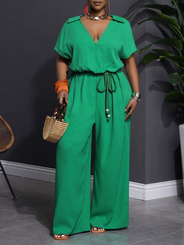 Slaydiva Lässiger Urlaubs Frühlings-/Sommer-Jumpsuit aus festem grünem Gewebe mit hochgeschlagenen Ärmeln, Kreuzkragen V-Ausschnitt, Stoffgürtel und extra weiten Beinen, Gewebe-Jumpsuit in Große Größen für Damen