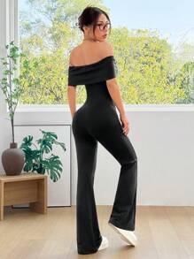 SHEIN EZwear Mono negro casual de punto holgado con hombros descubiertos y vuelo