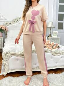 Conjuntos de pijama de mujer de manga corta con lazo, bordado de corazón y color contrastante de corte holgado