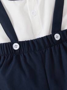 SHEIN Bộ 2 áo sơ mi tay ngắn có cổ và nơ cho bé trai kết hợp với quần short có dây đeo màu xanh navy giản dị, thích hợp cho các buổi đi chơi - Đen và trắng - Xem 5