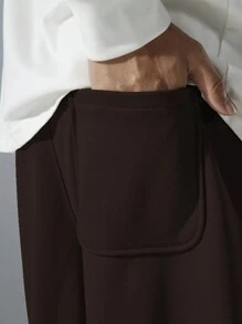 Manfinity Hypemode Pantalon de survêtement ample pour hommes avec cordon de serrage à la taille et poches en biais
