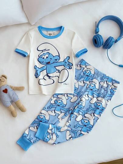 SHEIN X The Smurfs Young Boy Cartoon Print White Casual Versatile Short Sleeve T-Shirt And Blue All-Over Print Cute Casual Pants Pajama Set
