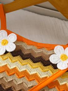 穿着五彩条纹和可爱包包连衣裙的小女孩